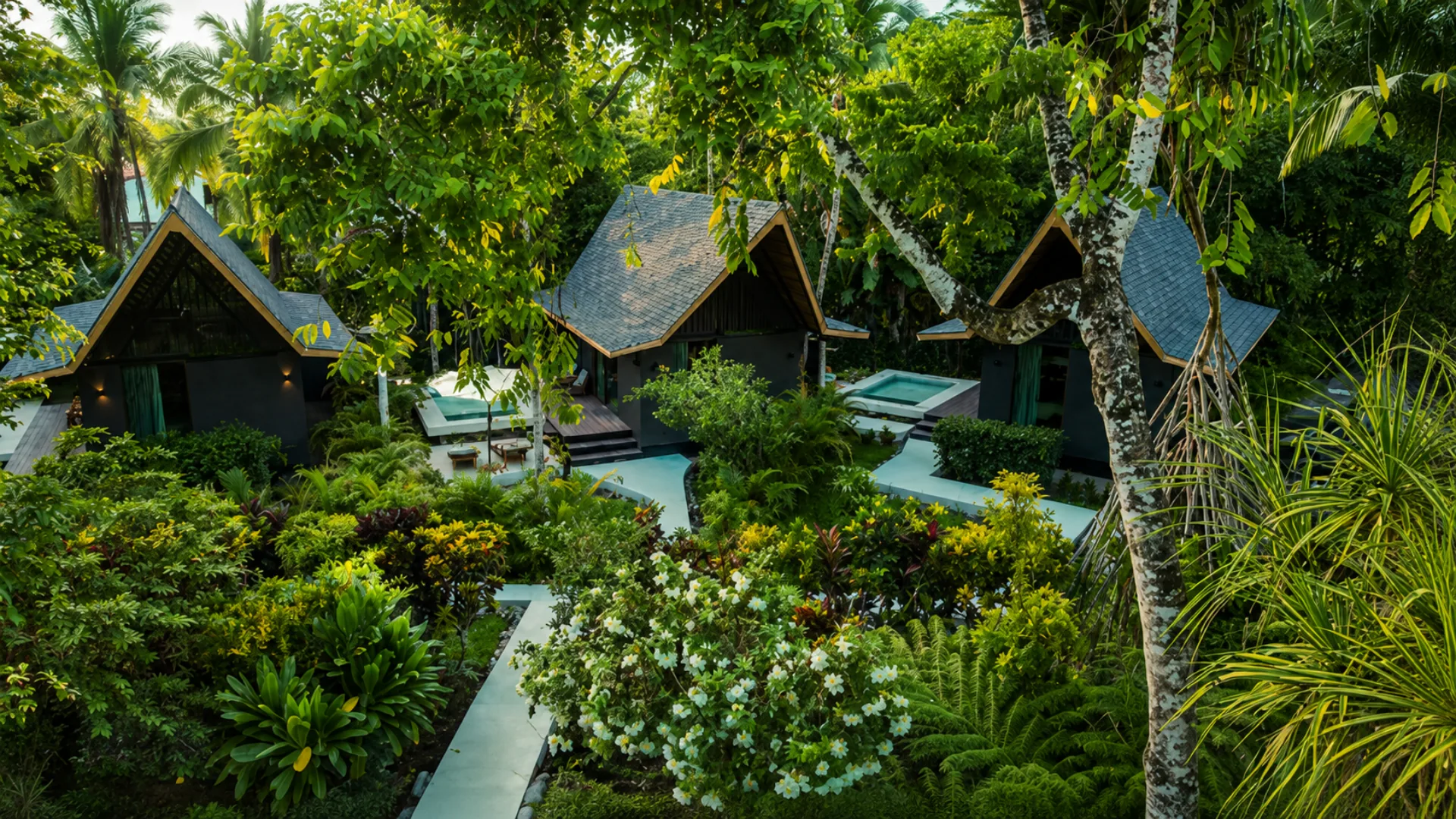 Private-pool bungalows among the gardens at Namú