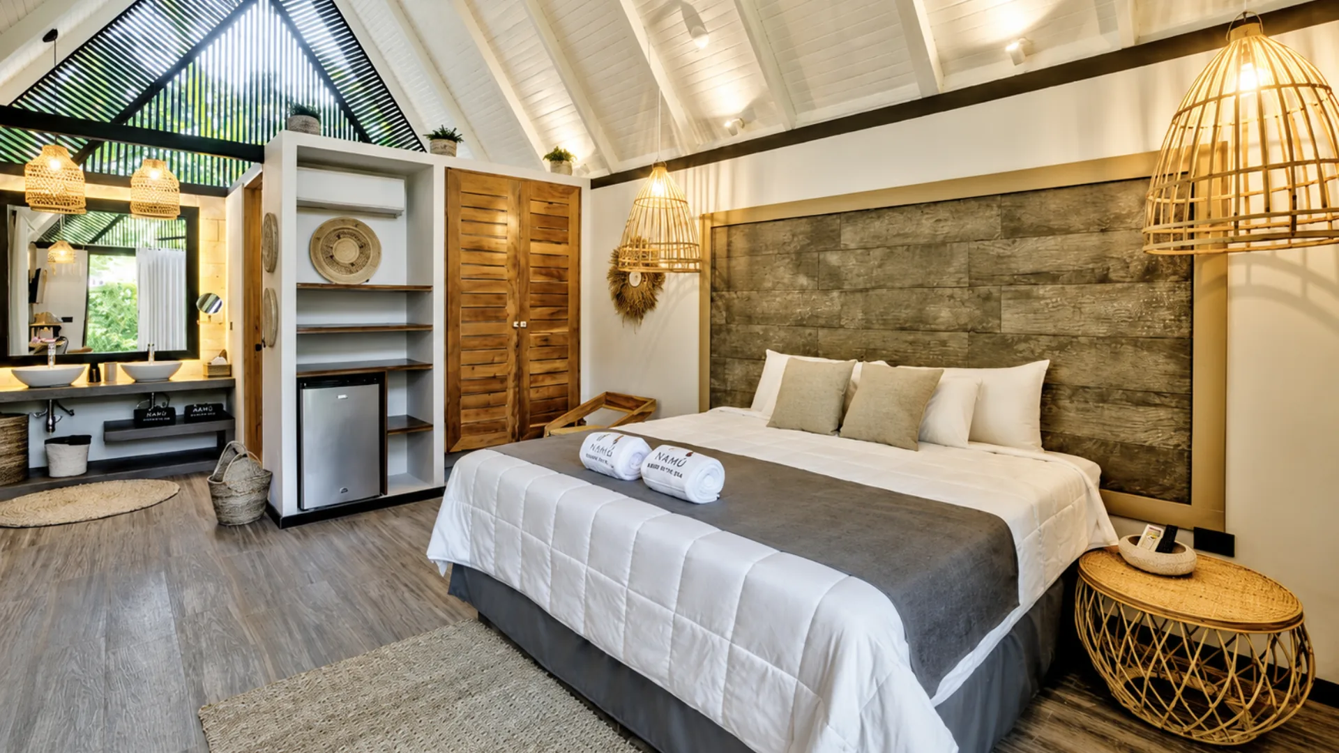 Bungalow bedroom beneath a high timber ceiling