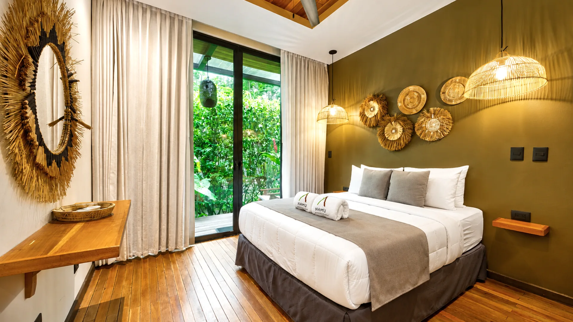 First Casa Namú suite with doors opening to the garden