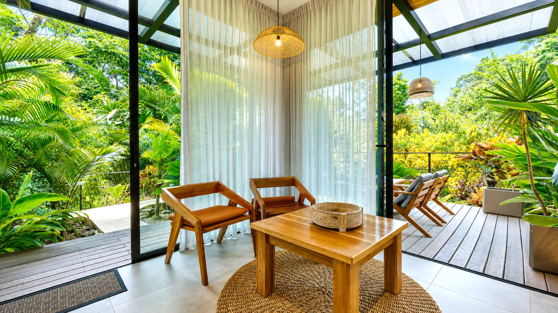 Casa Namú living room opening to two terraces and the garden