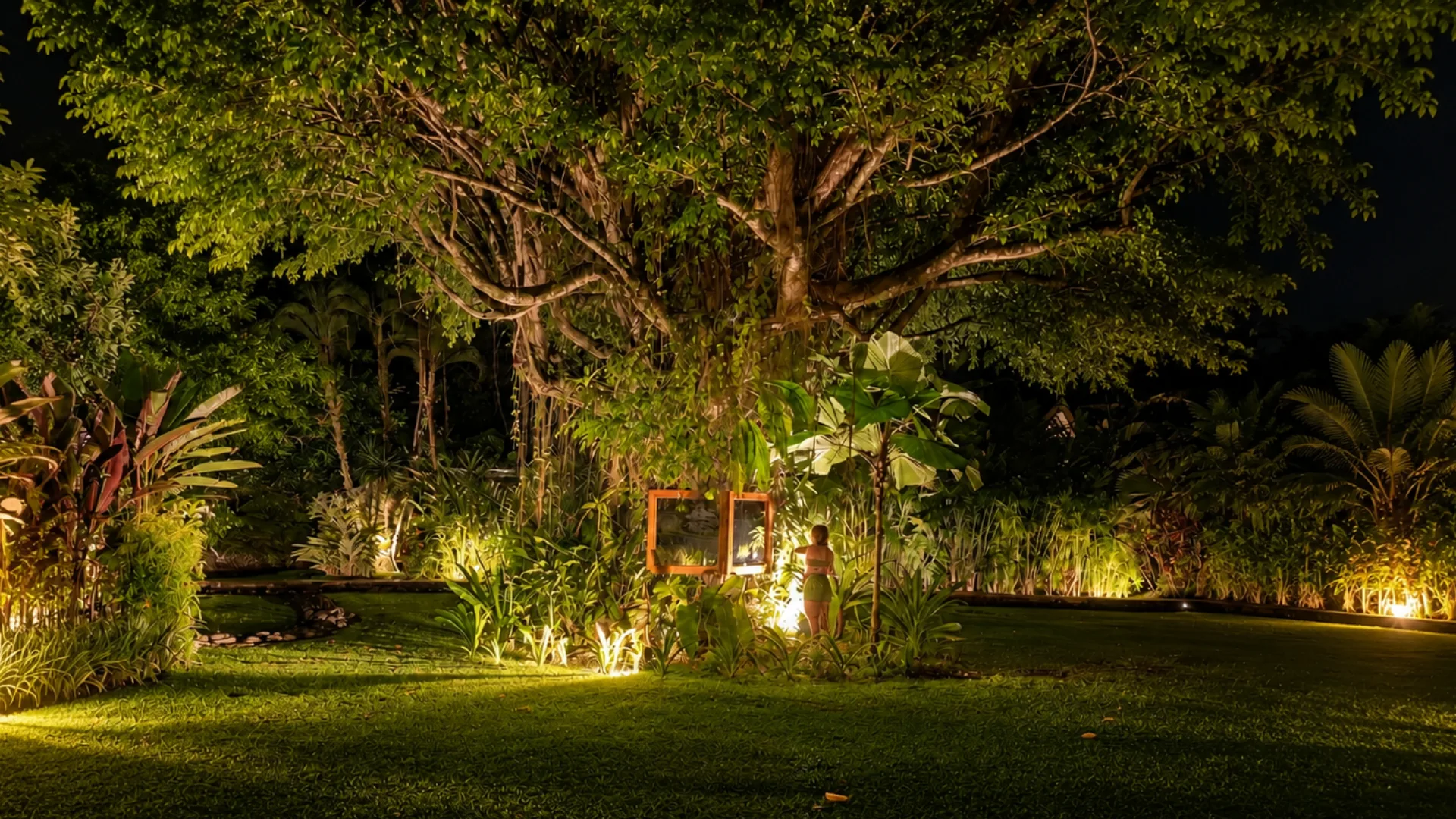 Casa Namú garden illuminated at night