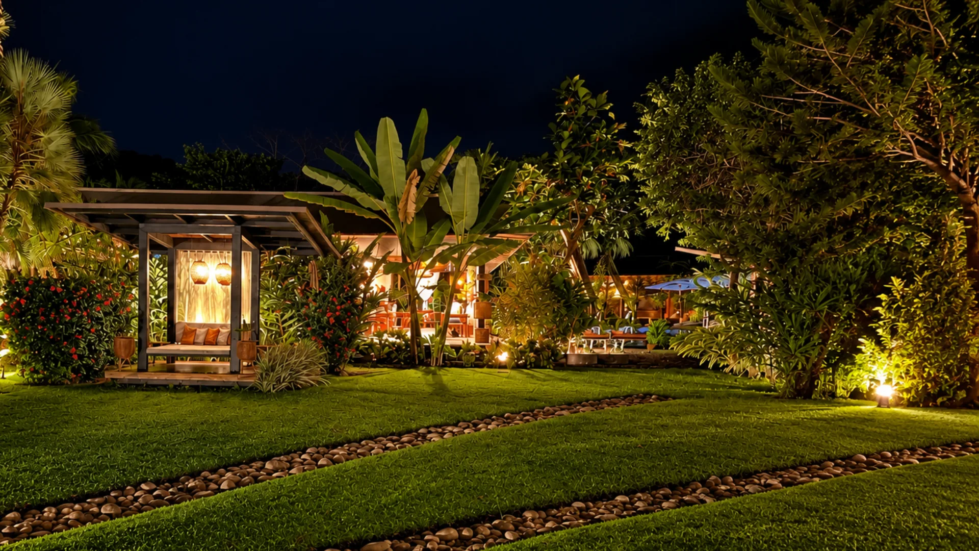 Illuminated garden outside the Master Room at night